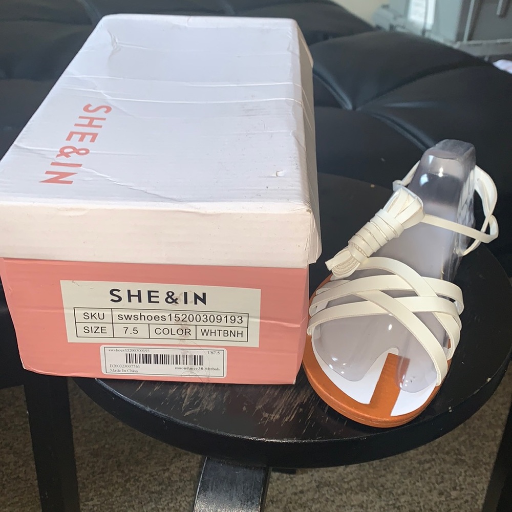 White tie up sandal in size 7.5.